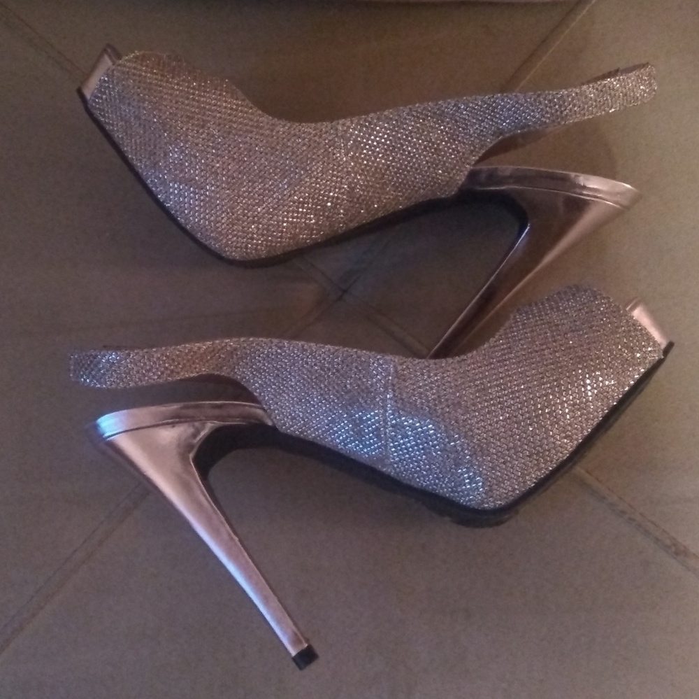 Peep toe silver stilettos